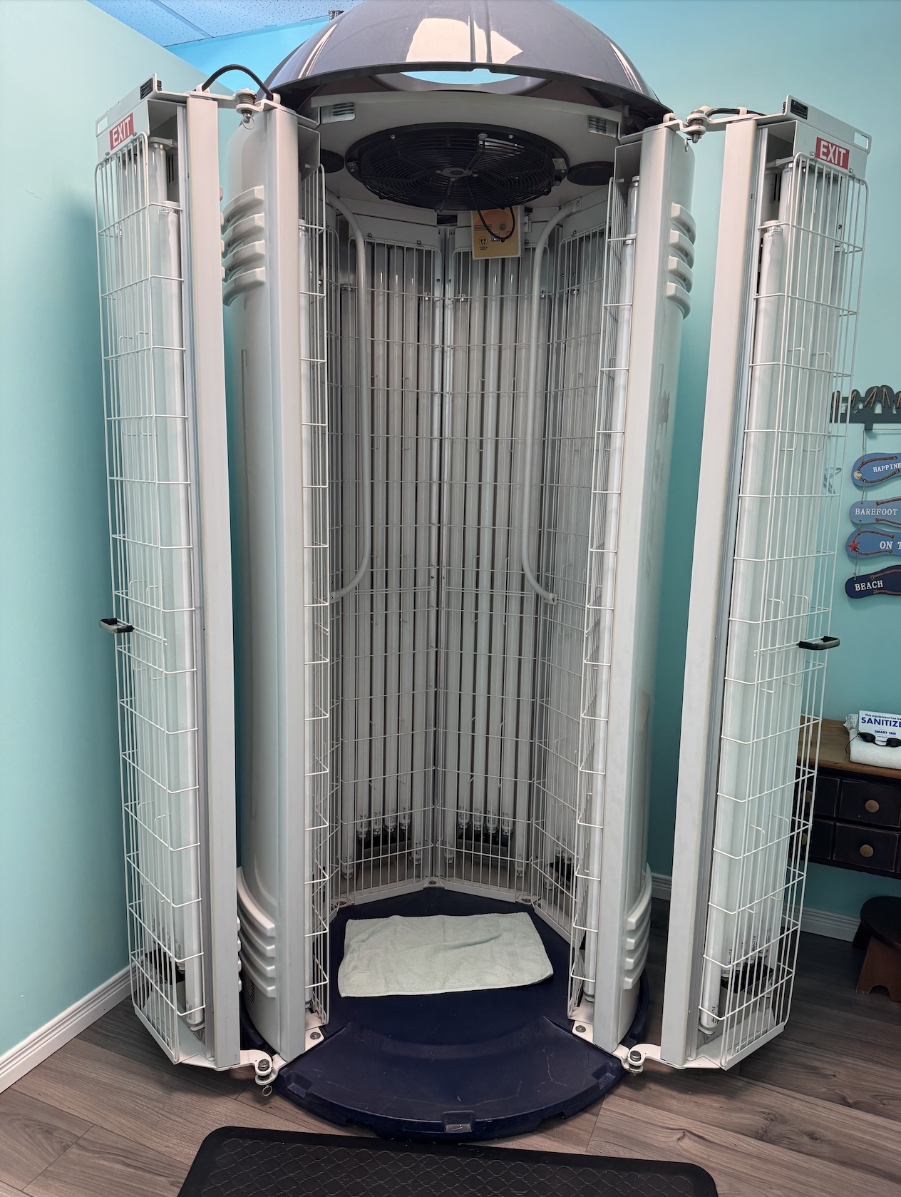 Mango Tango stand-up tanning booth at Tropical Tan